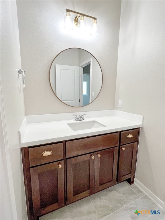 bathroom featuring vanity and tile patterned floors