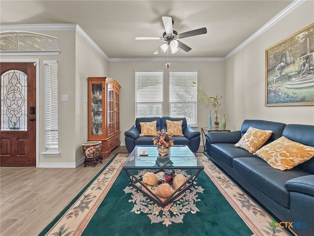 1306 Torino St, Harker Heights, TX 76548 - living room featuring wood finished floors, ceiling fan, baseboards, and crown molding