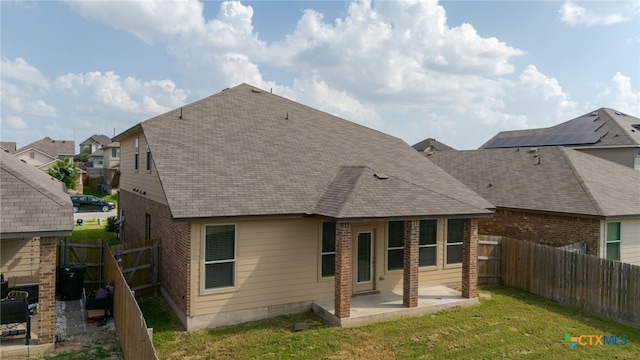 3411 Aubree Katherine Dr, Killeen, TX 76542 - rear view of property with a patio area, roof with shingles, brick siding, and a fenced backyard