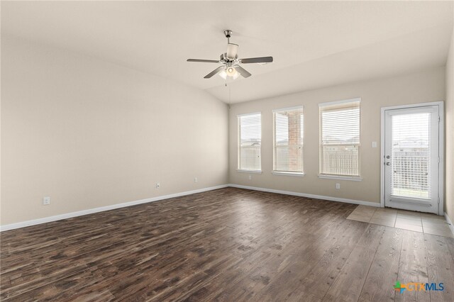 3411 Aubree Katherine Dr, Killeen, TX 76542 - empty room featuring wood finished floors, a ceiling fan, and vaulted ceiling