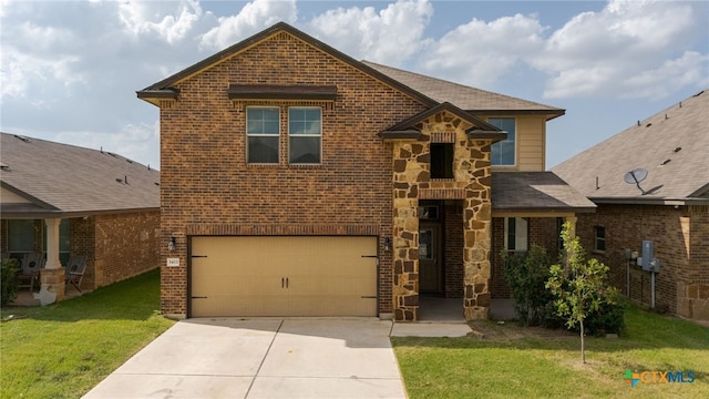 3411 Aubree Katherine Dr, Killeen, TX 76542 - traditional home featuring a garage, brick siding, concrete driveway, and a front yard