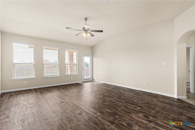 3411 Aubree Katherine Dr, Killeen, TX 76542 - unfurnished room featuring vaulted ceiling, ceiling fan, arched walkways, and dark wood finished floors