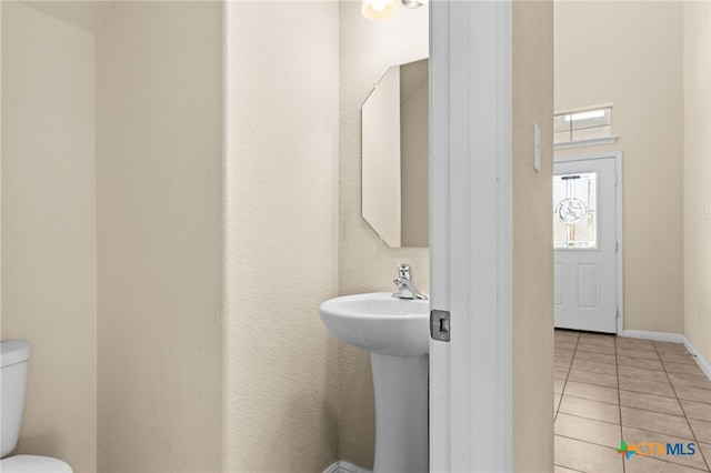 3411 Aubree Katherine Dr, Killeen, TX 76542 - half bathroom featuring toilet and tile patterned floors