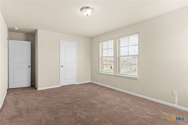 3411 Aubree Katherine Dr, Killeen, TX 76542 - unfurnished bedroom featuring carpet flooring and baseboards