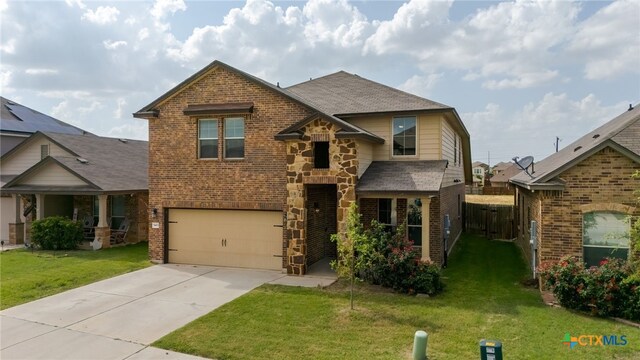 3411 Aubree Katherine Dr, Killeen, TX 76542 - view of front of house with brick siding, a garage, concrete driveway, and roof with shingles