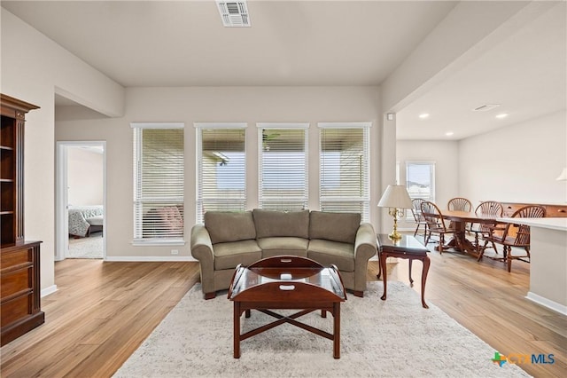 7109 Hammermill Ln, Temple, TX 76502 - living area featuring light wood finished floors and recessed lighting