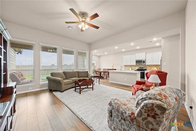 7109 Hammermill Ln, Temple, TX 76502 - living area with recessed lighting, ceiling fan, and light wood-type flooring