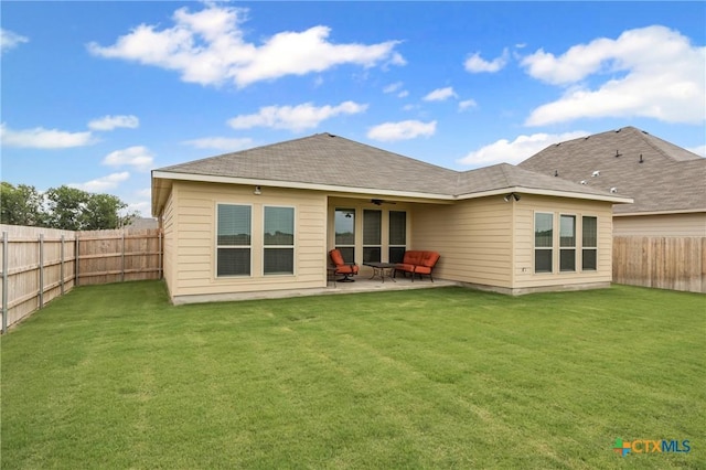 7109 Hammermill Ln, Temple, TX 76502 - rear view of property featuring ceiling fan, a fenced backyard, and a patio area