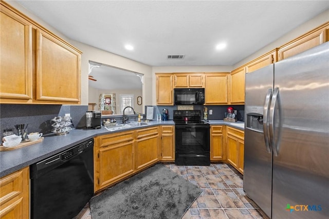 2903 Curtis Dr, Copperas Cove, TX 76522 - kitchen with black appliances, recessed lighting, and dark countertops