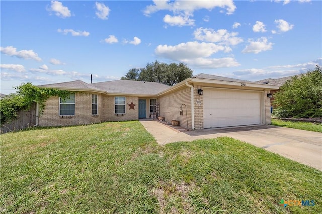 2903 Curtis Dr, Copperas Cove, TX 76522 - ranch-style home with brick siding, a garage, and concrete driveway