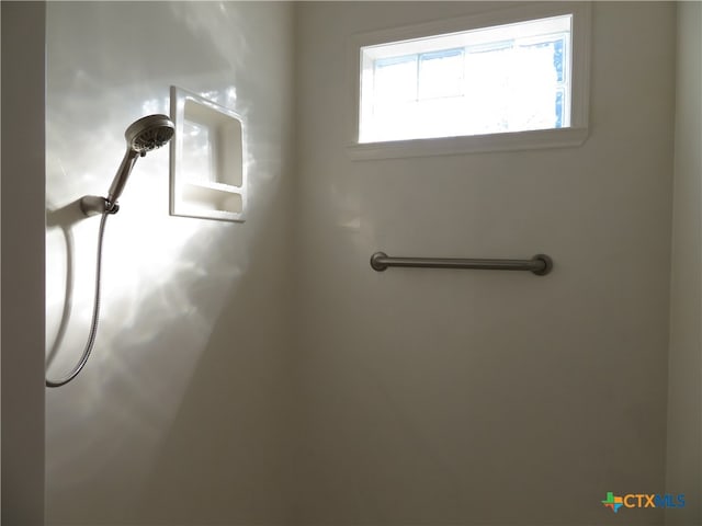 bathroom with a shower