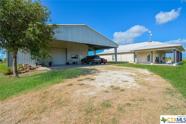 view of yard featuring a garage