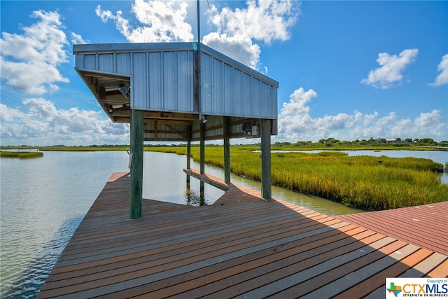 dock area featuring a water view