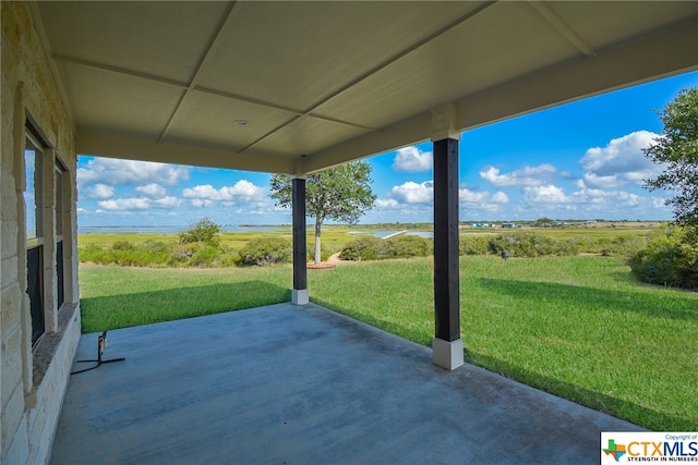 view of patio / terrace with a rural view