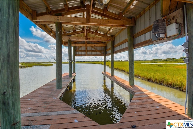 view of dock with a water view