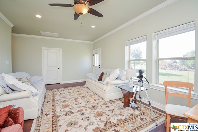 living room with ceiling fan, wood-type flooring, and ornamental molding