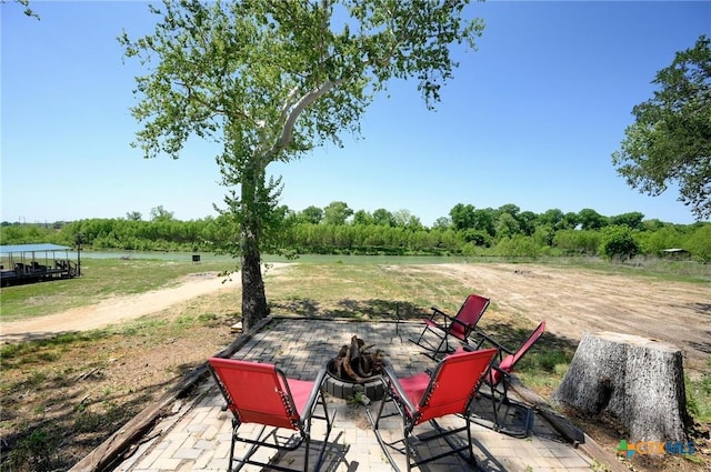 view of patio / terrace featuring a fire pit