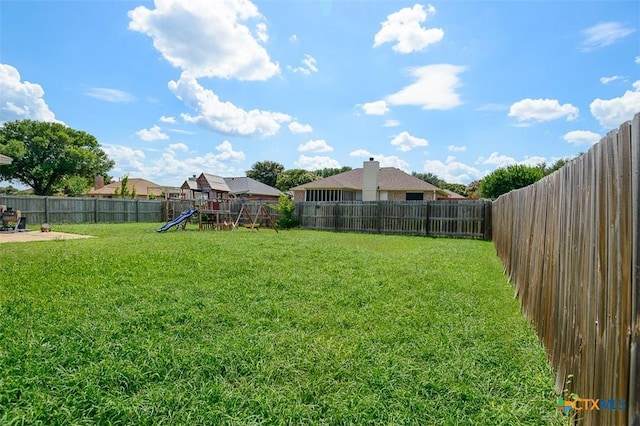5005 Topsey Dr, Killeen, TX 76542 - fenced backyard featuring a playground
