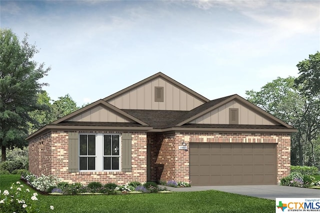 view of front of house featuring a garage and a front lawn