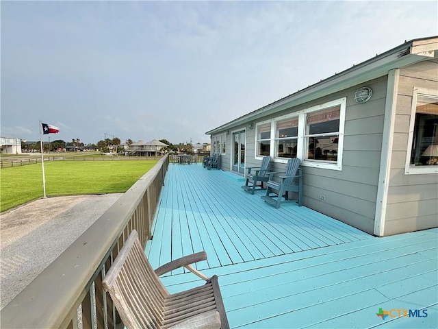 1007 N Washington Blvd, Port Oconnor, TX 77982 - wooden deck with a yard