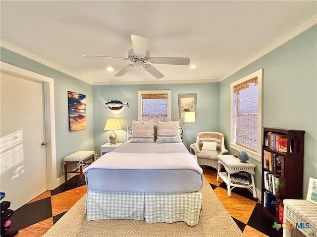 1007 N Washington Blvd, Port Oconnor, TX 77982 - bedroom with ceiling fan, recessed lighting, and light wood-style flooring