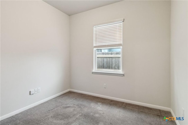 310 Spiny Lizard Ln, San Marcos, TX 78666 - carpeted spare room featuring baseboards