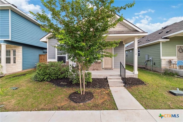 310 Spiny Lizard Ln, San Marcos, TX 78666 - view of front of home featuring a front yard and covered porch