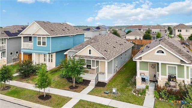 310 Spiny Lizard Ln, San Marcos, TX 78666 - view of front of property featuring covered porch, a residential view, and a front lawn