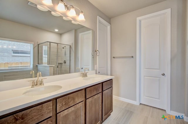 bathroom featuring vanity and walk in shower