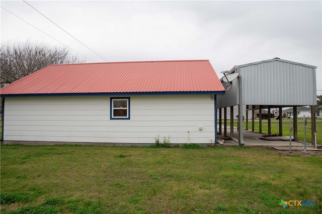 203 S Gisler St, Austwell, TX 77950 - view of home's exterior with a yard