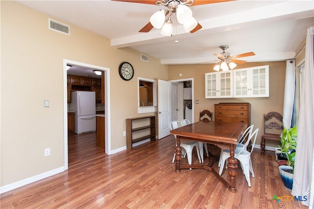 1401 N Penelope St, Belton, TX 76513 - dining area with ceiling fan, light wood-style floors, and beam ceiling