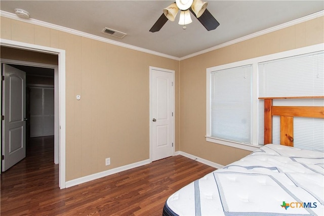 1401 N Penelope St, Belton, TX 76513 - bedroom featuring crown molding, wood finished floors, and ceiling fan