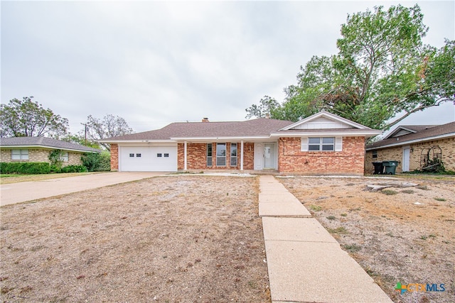 single story home with a garage