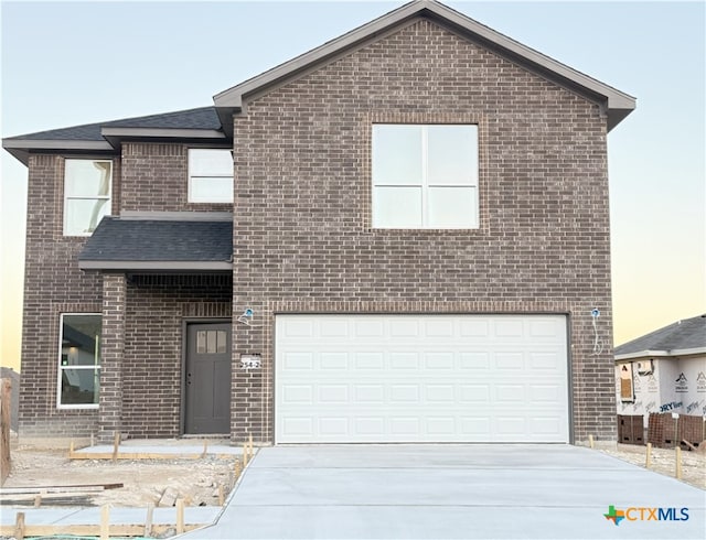 view of front facade with a garage