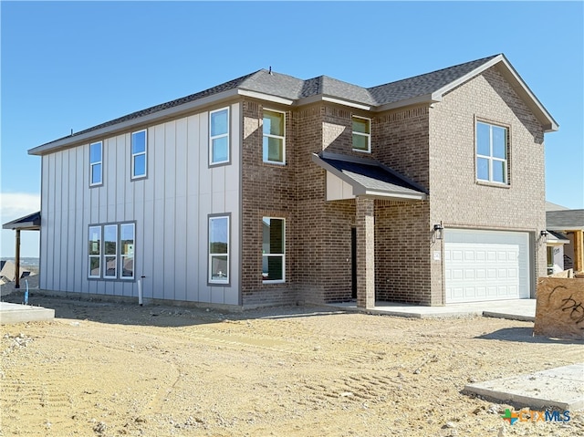 view of front of house with a garage