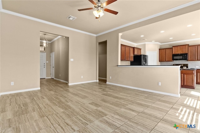 unfurnished living room featuring ceiling fan with notable chandelier and crown molding