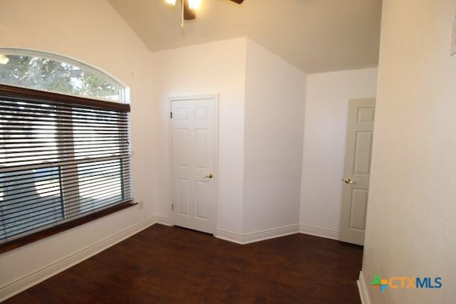 unfurnished room featuring ceiling fan and lofted ceiling