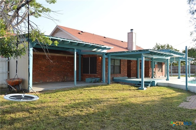391 County Road 3150, Kempner, TX 76539 - back of house with a pergola, brick siding, a patio area, and a chimney