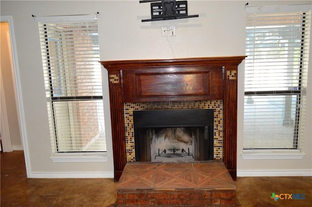 391 County Road 3150, Kempner, TX 76539 - detailed view of baseboards and a tiled fireplace