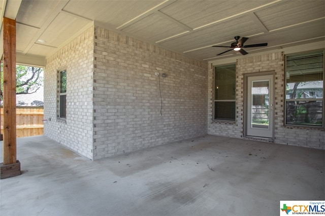 view of patio featuring ceiling fan