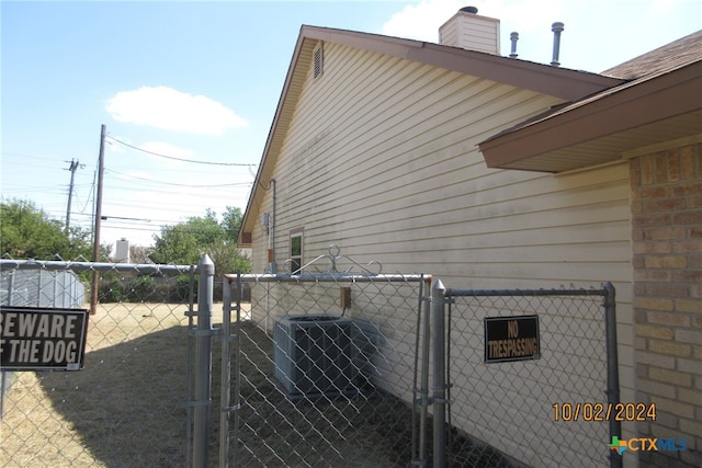 view of property exterior with cooling unit