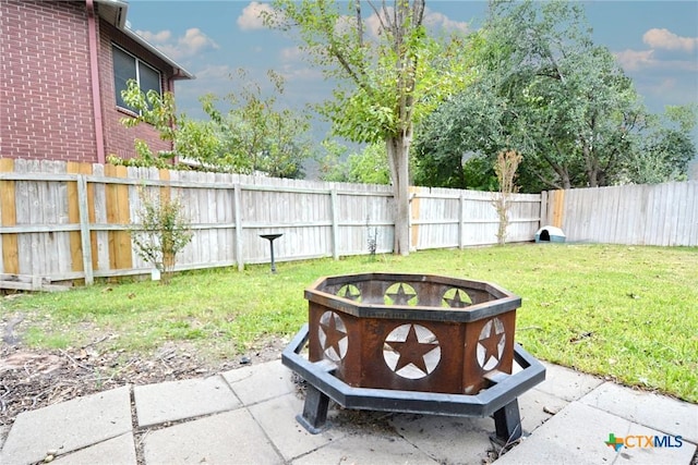 view of yard with a fenced backyard