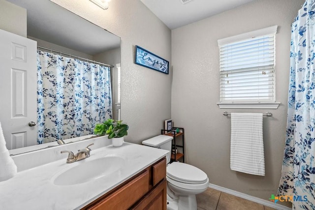 7621 Amber Meadow Loop, Temple, TX 76502 - full bathroom with vanity, tile patterned flooring, toilet, and a shower with curtain