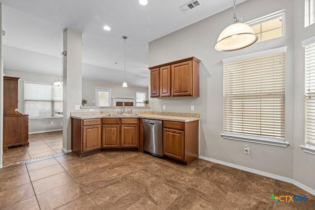 7621 Amber Meadow Loop, Temple, TX 76502 - kitchen featuring dishwasher, a sink, brown cabinets, decorative light fixtures, and recessed lighting