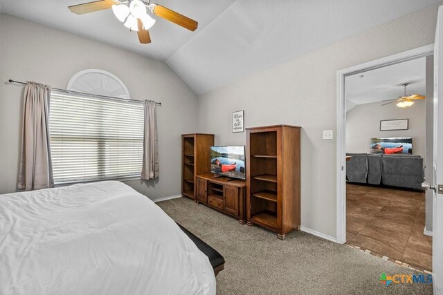 7621 Amber Meadow Loop, Temple, TX 76502 - bedroom featuring lofted ceiling, baseboards, ceiling fan, and carpet floors