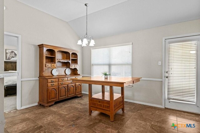 7621 Amber Meadow Loop, Temple, TX 76502 - dining area featuring vaulted ceiling, a chandelier, and baseboards
