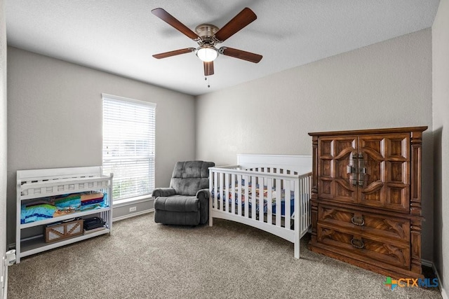 7621 Amber Meadow Loop, Temple, TX 76502 - bedroom featuring carpet, a nursery area, and ceiling fan