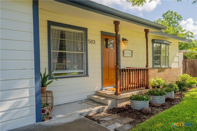 503 Maresh St, Taylor, TX 76574 - property entrance featuring a porch