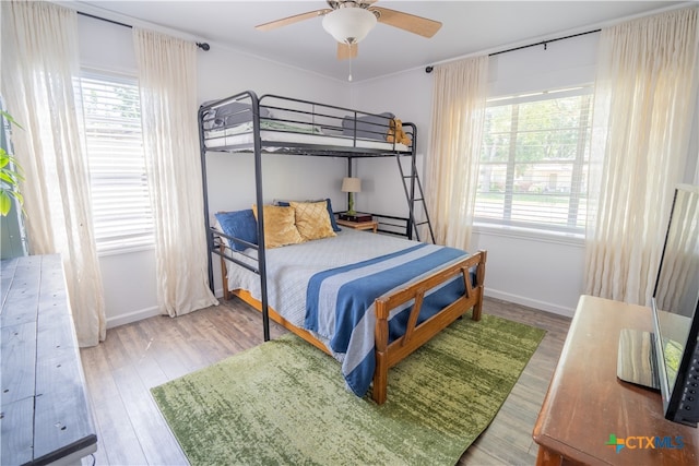 503 Maresh St, Taylor, TX 76574 - bedroom with wood finished floors and ceiling fan