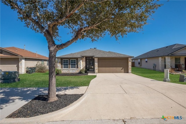 ranch-style house with a garage, stone siding, driveway, and a front yard